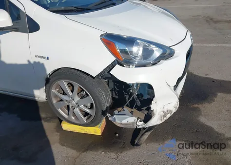 2015 Toyota Prius C Four from USA, damaged, VIN JTDKDTB35F1086351